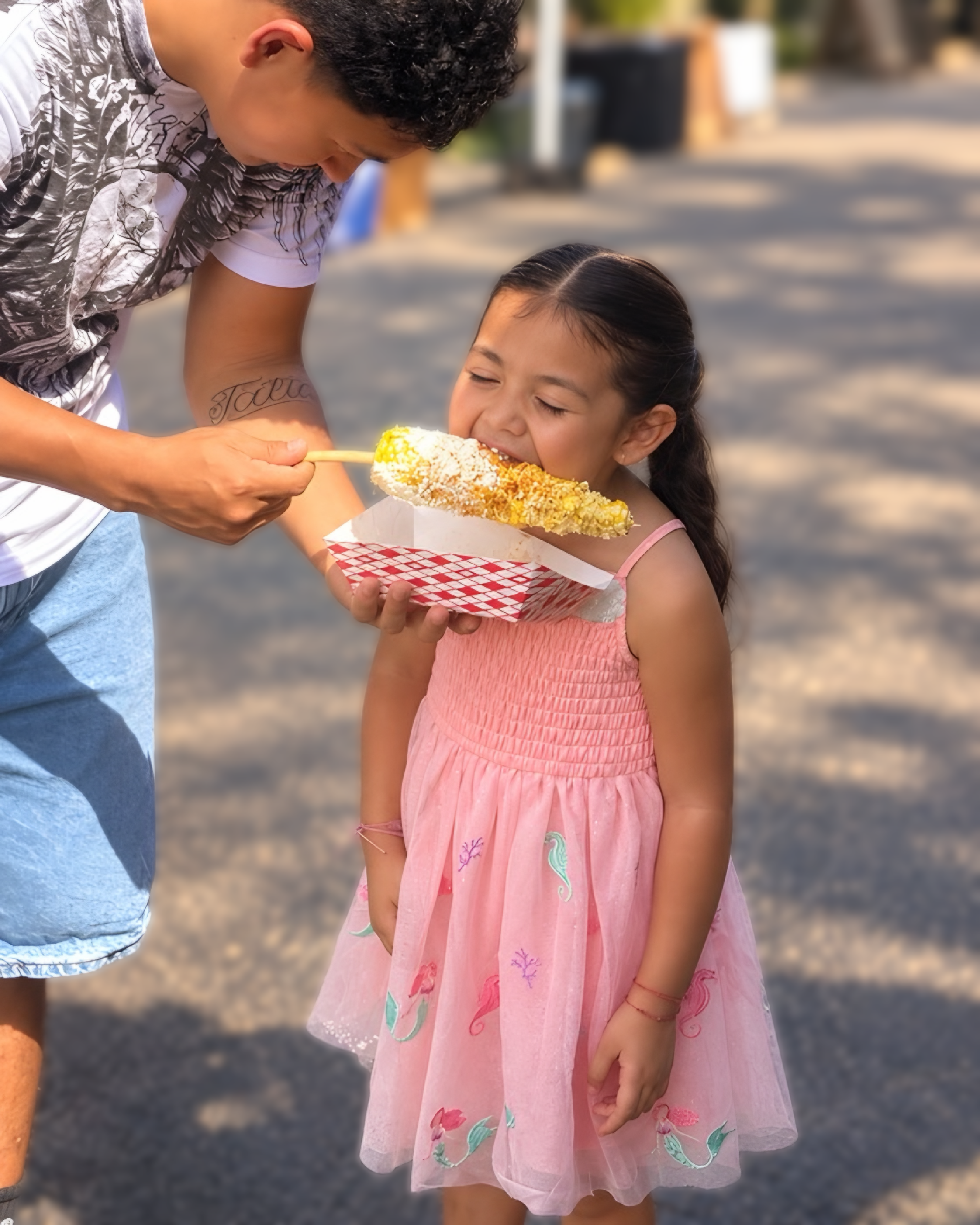 Customer enjoying Botana 404 elote